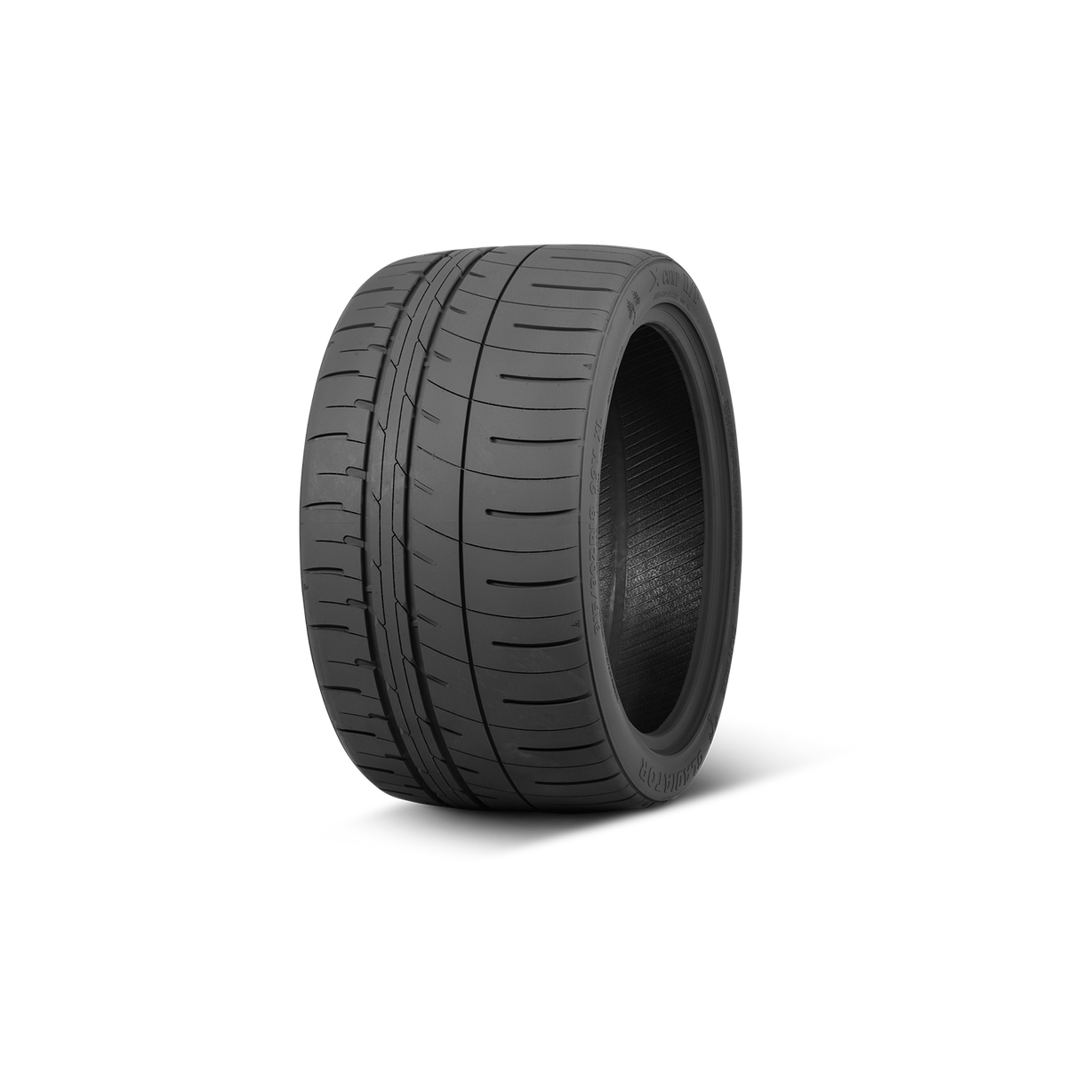 XCOMP H/P — representative model photo; size and sidewall markings may vary